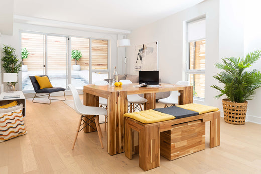 A well light small living room with modern furniture.