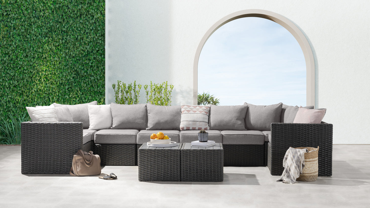 https://transformertable.com/cdn/shop/products/Transformer-patio-set-grey-wicker-grey-cushion-double-set-lifestyle-1.jpg?v=1688490017&width=1500